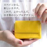 スペインから新しいカタチ。引き算のシンプルデザイン。黄色いミニ財布